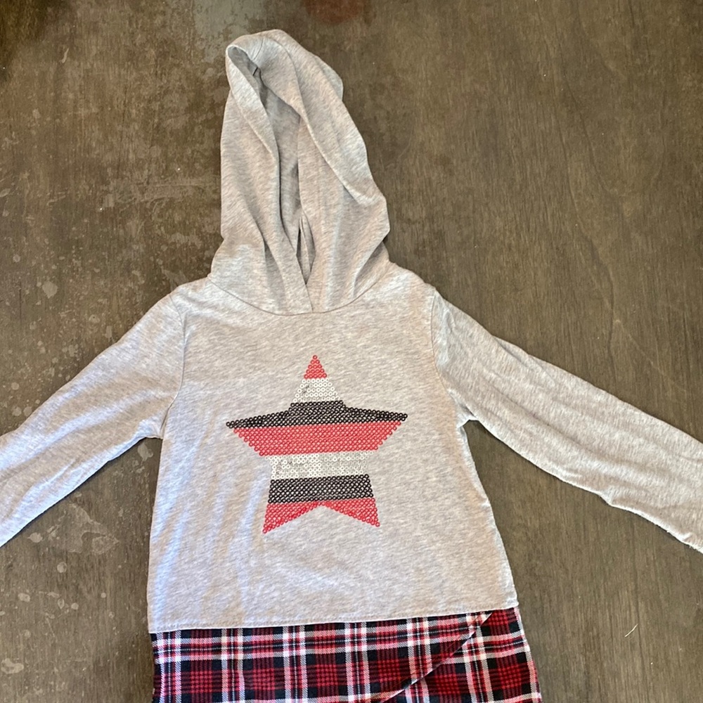 New 3T Girls Long Sleeve Tee with plaid look on the bottom of the shirt.